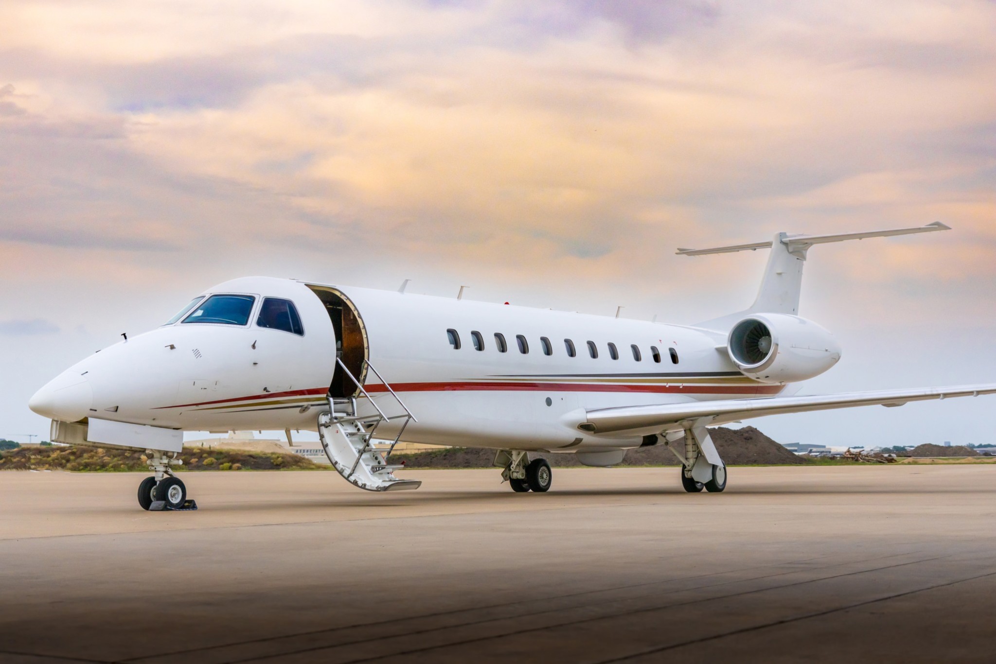 Embraer Legacy on ramp with open stair door
